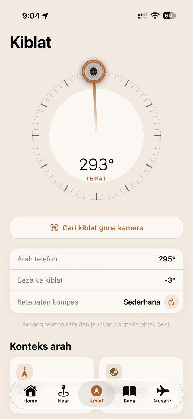Skrin arah kiblat dengan butang cari kiblat guna kamera